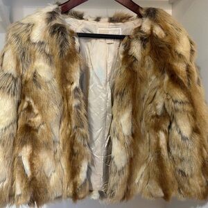 S / Michael kors faux fur coat.  Wearing with a pair of jeans. Very cute!